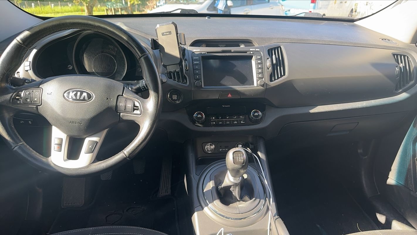 Kia Sportage - Photo 11