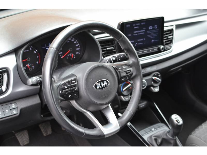 Kia Rio - Photo 41