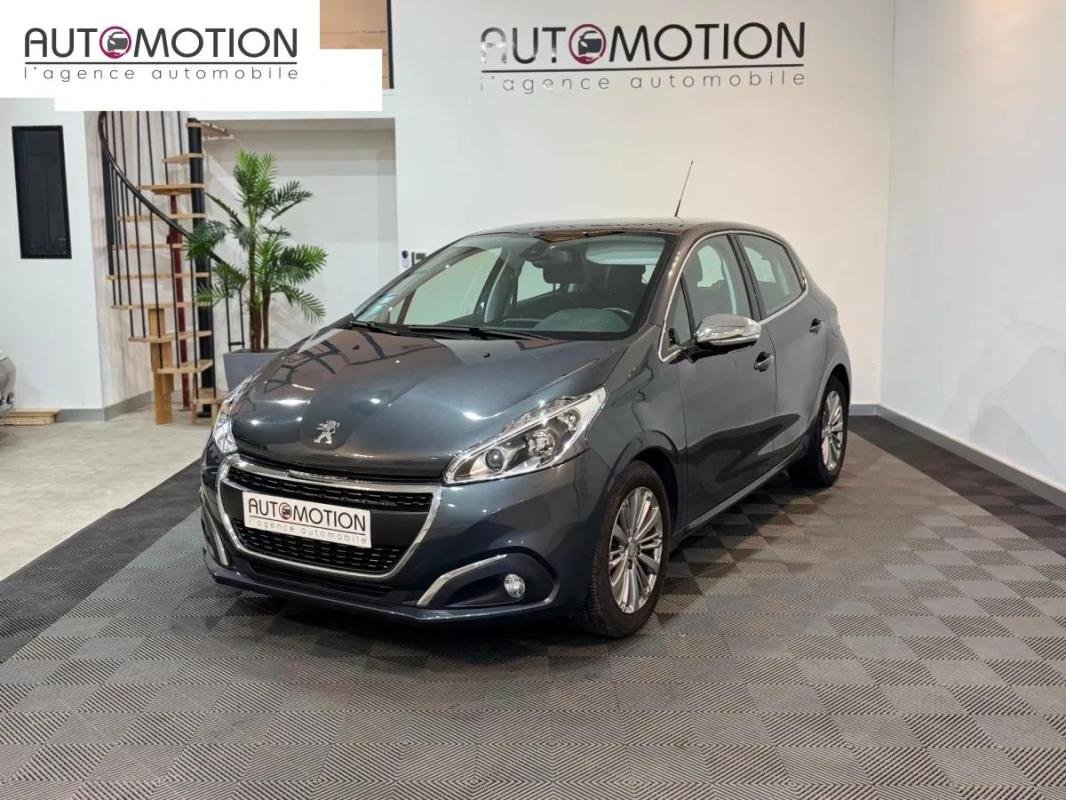 Peugeot 208 - Photo 1