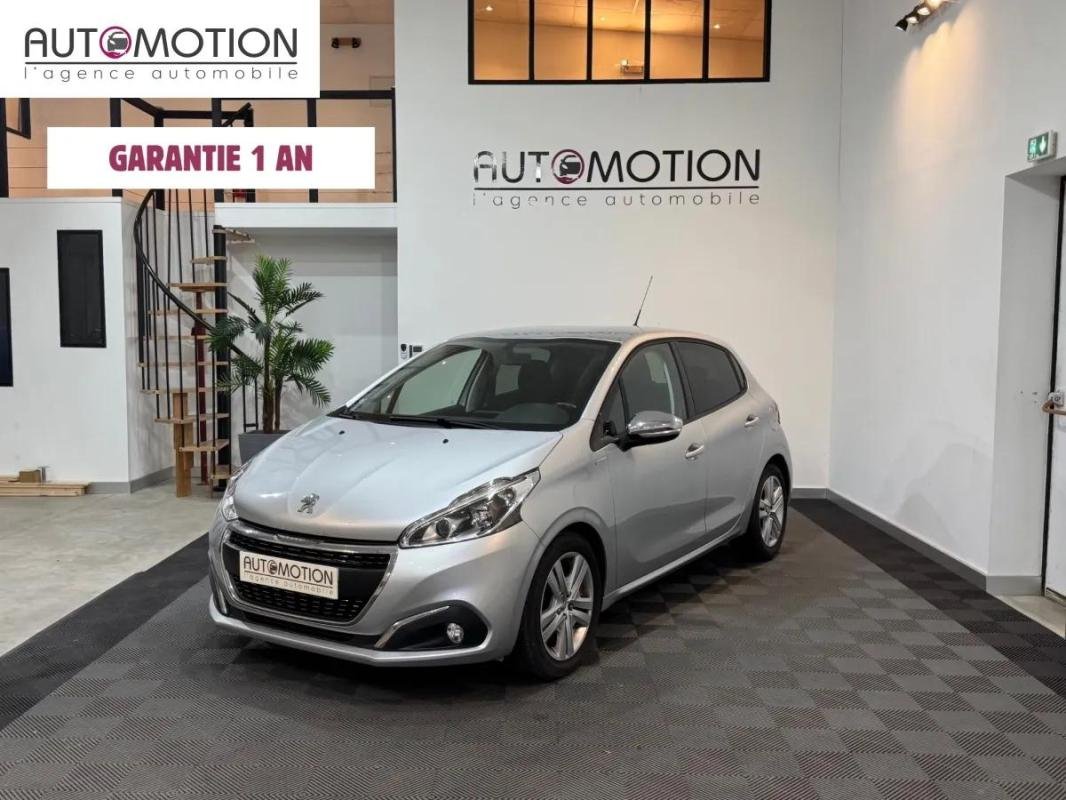 Peugeot 208 - Photo 1