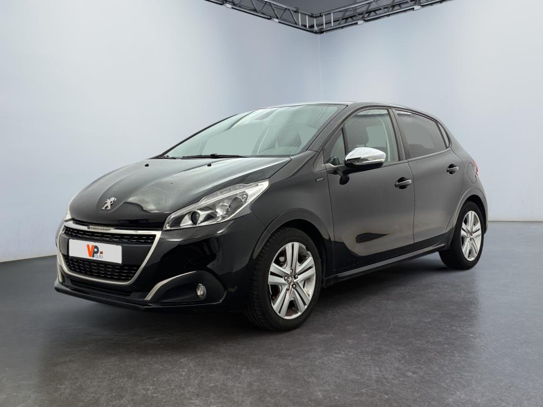 Peugeot 208 - Photo 1