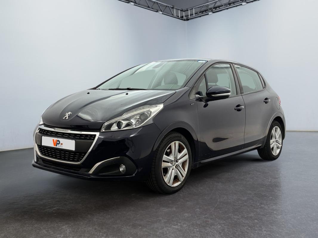 Peugeot 208 - Photo 1